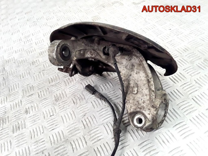 Кулак поворотный передний левый VW Passat B6