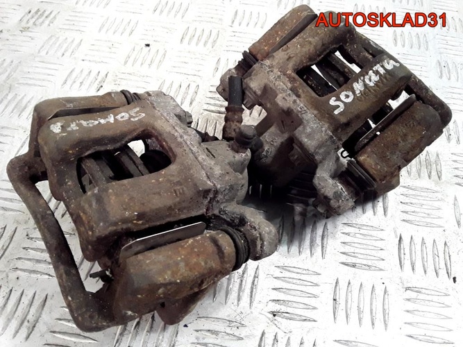 Суппорт тормозной задний Hyundai Sonata 6 2,0 G4KH Бензин