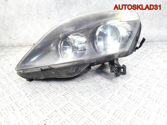 Фара левая Opel Zafira B 24451052