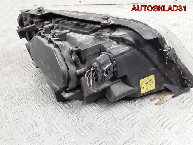 Фара левая Volkswagen Sharan 7M3941015AB